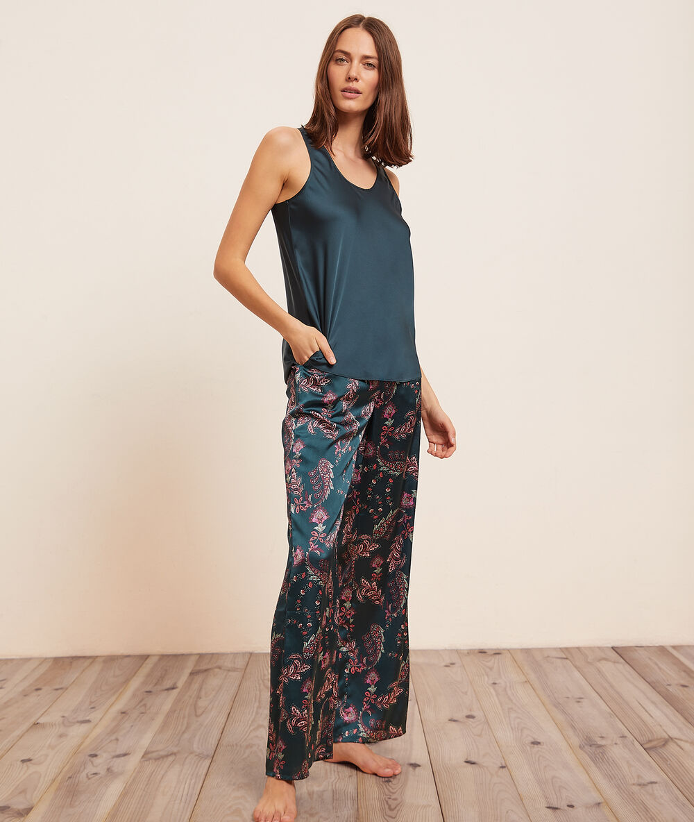 Pantalon satiné imprimé vert.