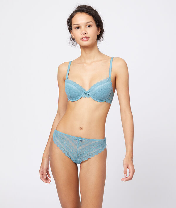 Tanga en dentelle géométrique bleu.
