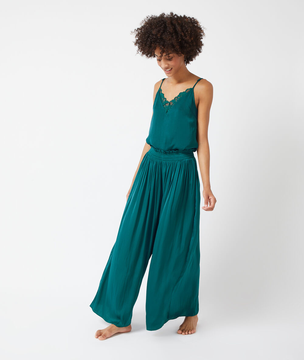 Pantalon satiné, smocké à la taille bleu canard.