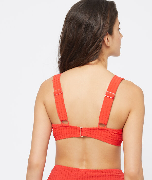 Haut de maillot de bain ampliforme, matiéré rouge.