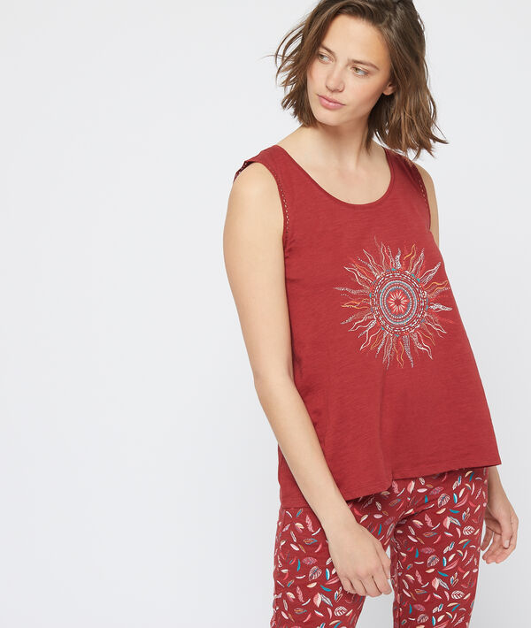 Débardeur à motif soleil rouge.