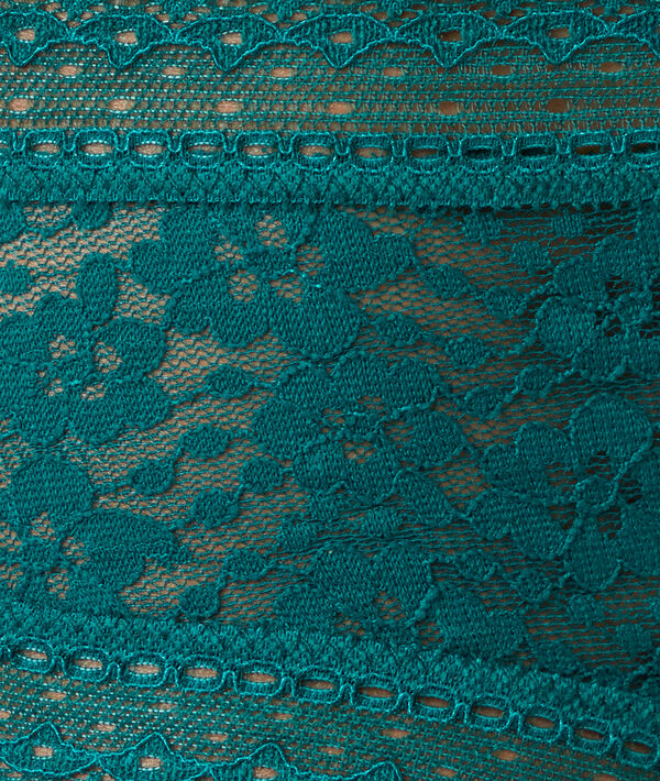 Tanga en dentelle emeraude.