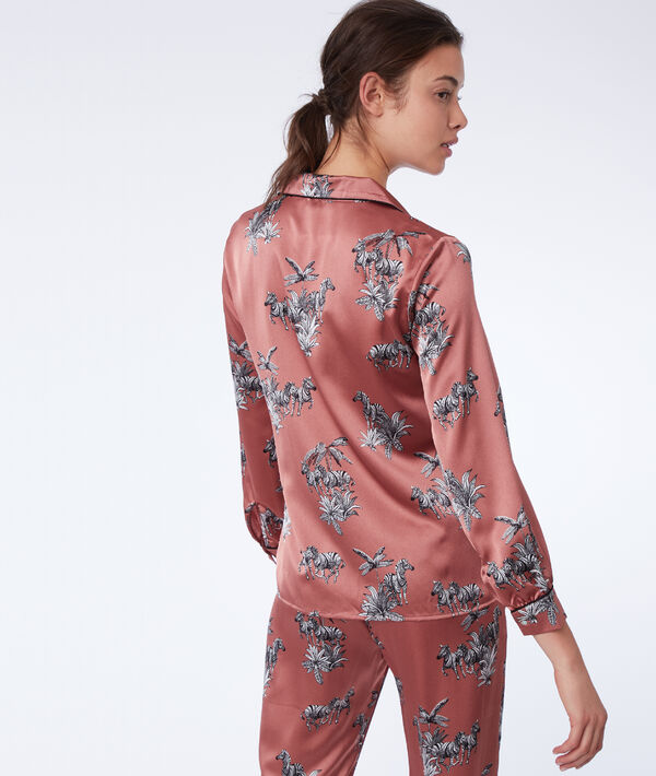 Chemise de pyjama imprimé zèbres rose.