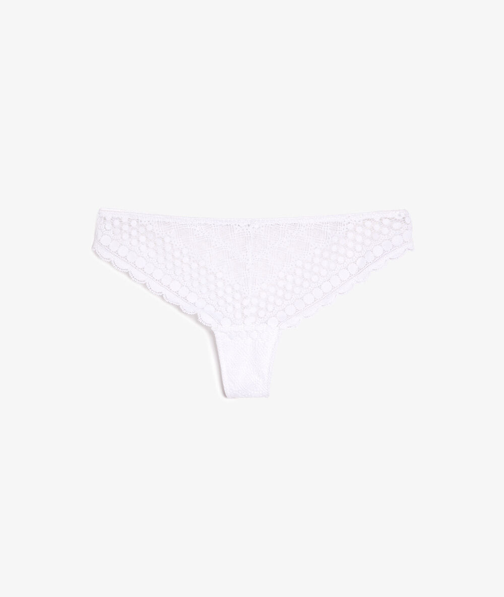 Tanga en dentelle blanc.