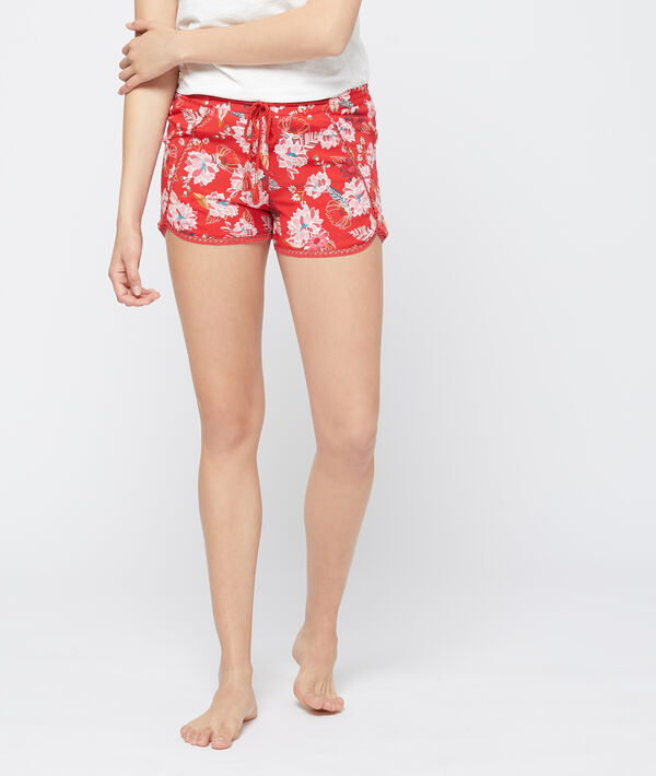 Short imprimé fleurs de lotus rouge.