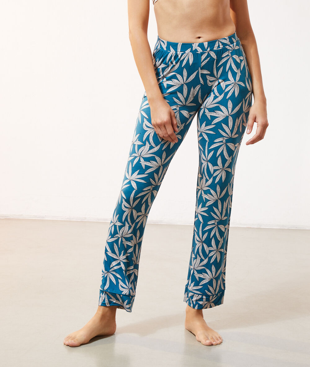 Pantalon imprimé feuillage bleu canard.