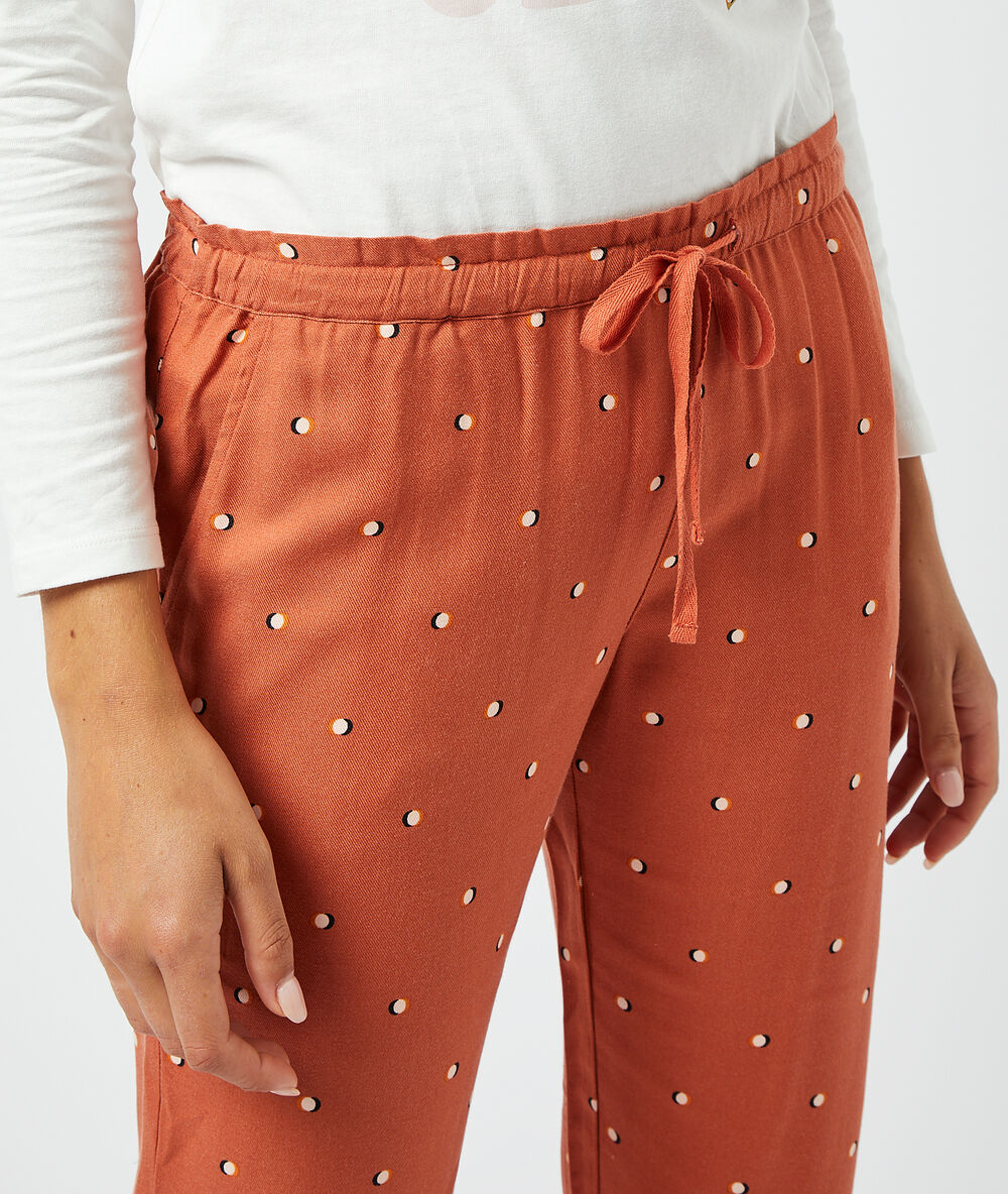 Pantalon imprimé brique roux.