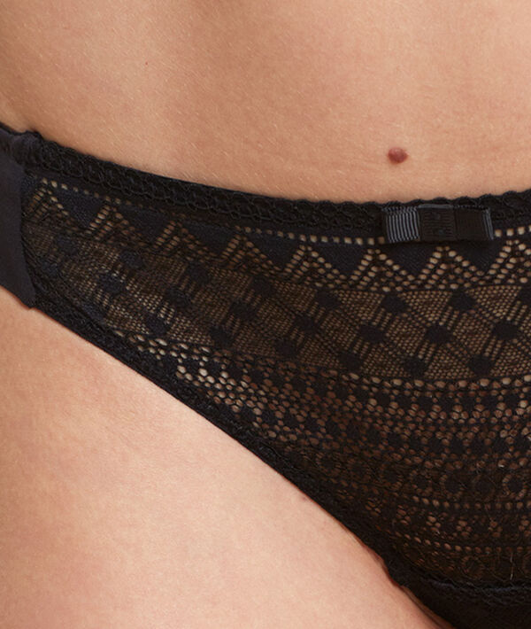 Tanga en microfibre et dentelle graphique noir.