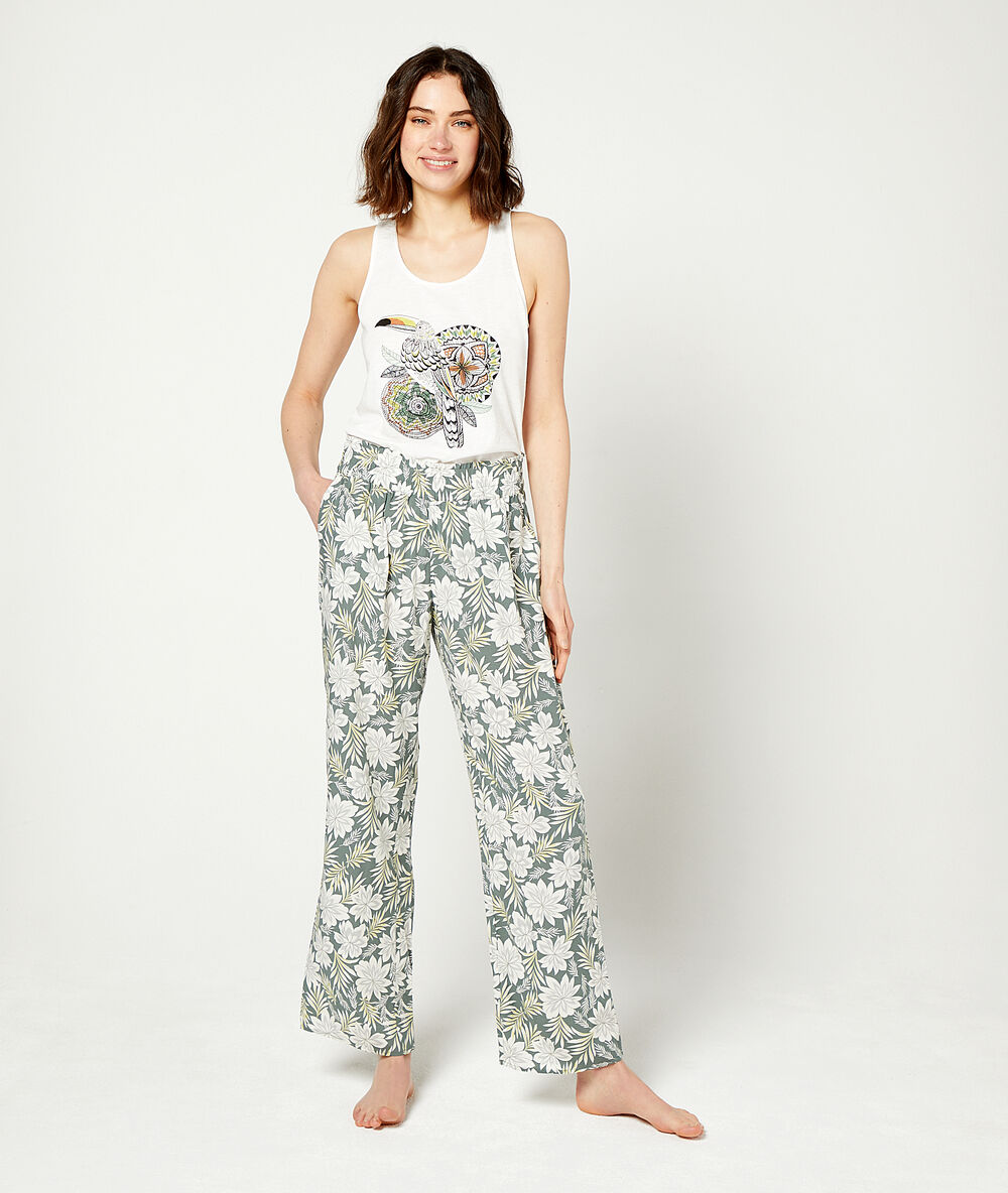 Pantalon imprimé fleuri kaki.