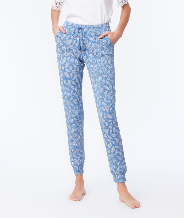 Pantalon noué imprimé floral bleu.