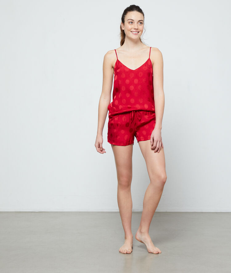 Short de pyjama à pois rouge.