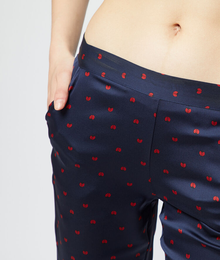Pantalon satiné imprimé coccinelles bleu.