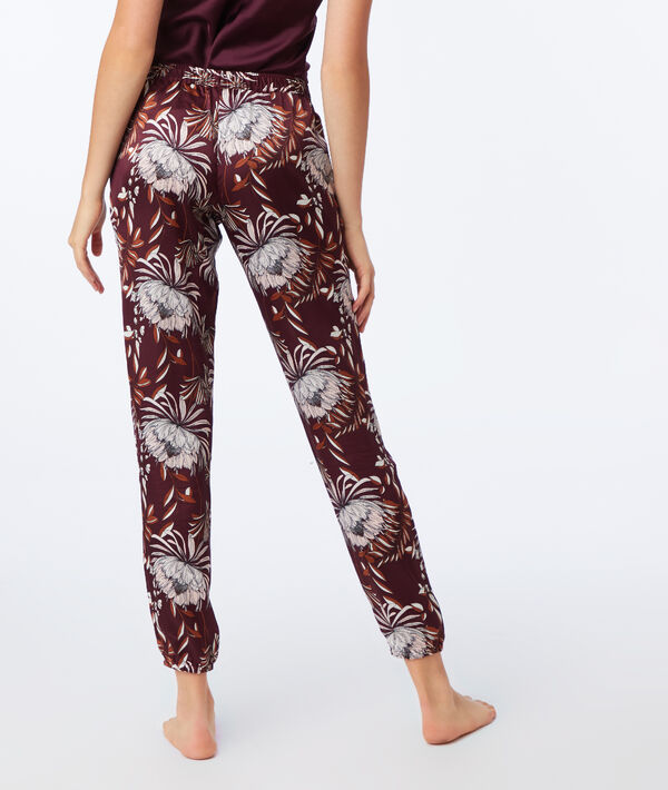 Pantalon satiné imprimé floral bordeaux grenat.