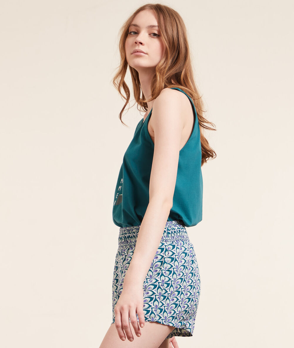 Short de pyjama imprimé vert.