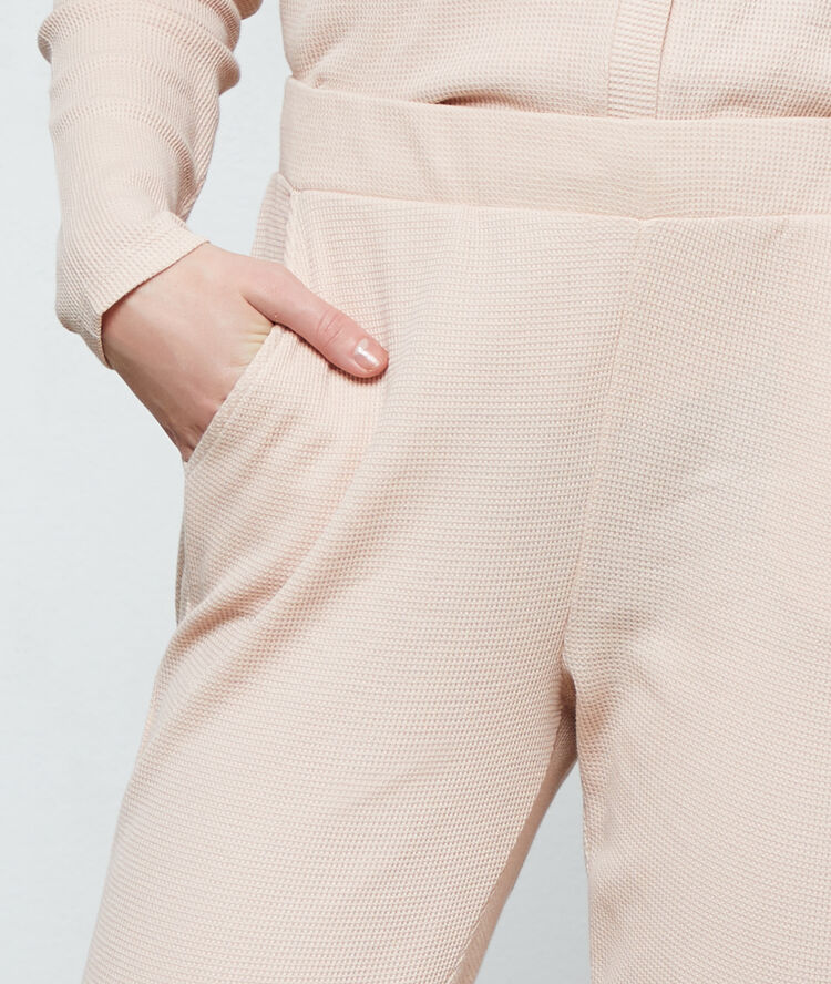 Pantalon de pyjama en coton rose.