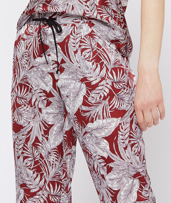 Pantalon imprimé feuillage brique roux.