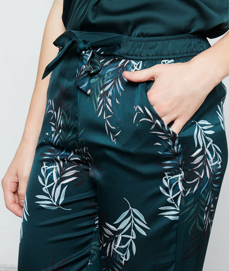Pantalon satiné imprimé feuillage vert sapin.