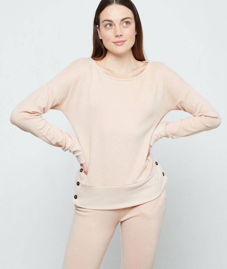 Top manches longues, détails boutons rose.