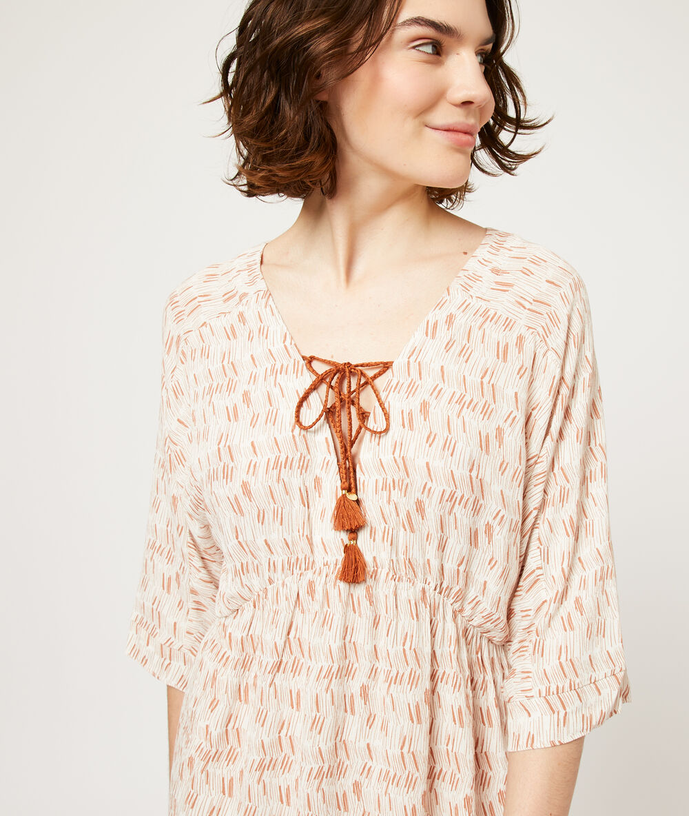 Chemise de nuit à pompons terracotta.