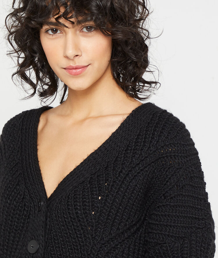 Gilet en grosse maille noir.