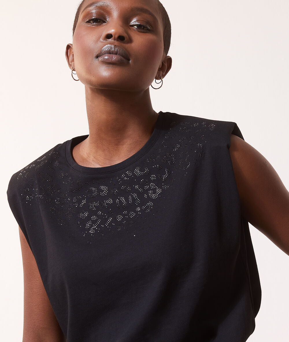 Top épaulettes avec strass noir.