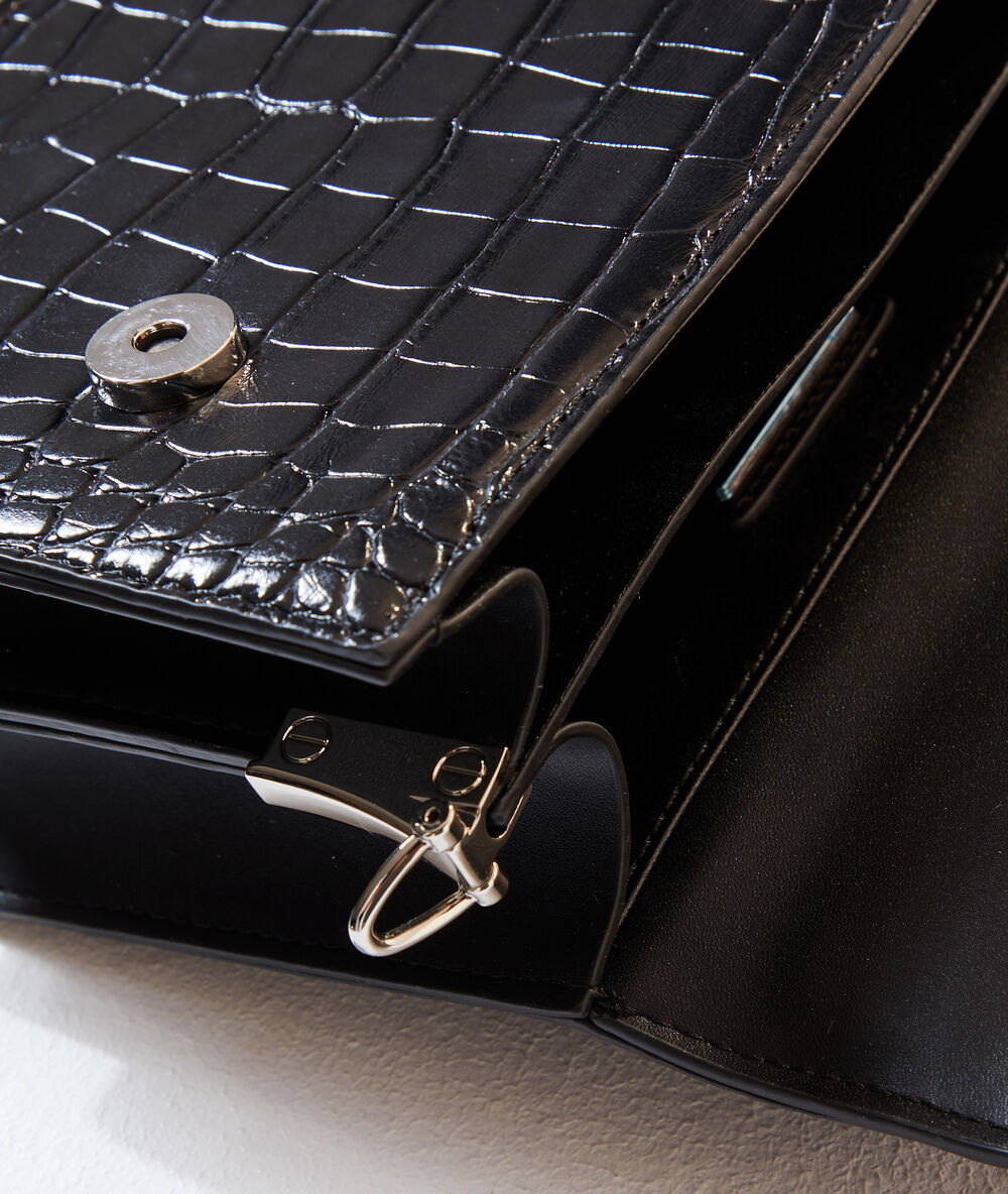 Sac à bandoulière effet croco noir.
