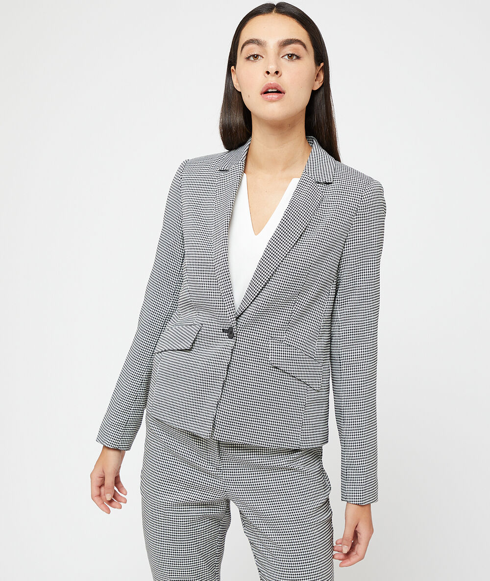 Veste de tailleur motifs pied de poule noir.