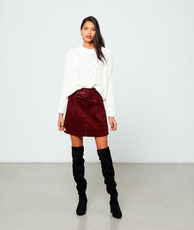 Pull torsadé en grosse maille creme.
