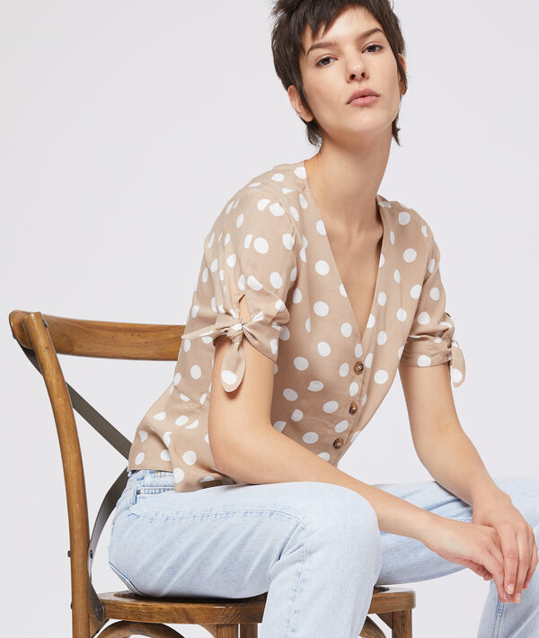 Blouse nouée à pois Blouse nouée à pois