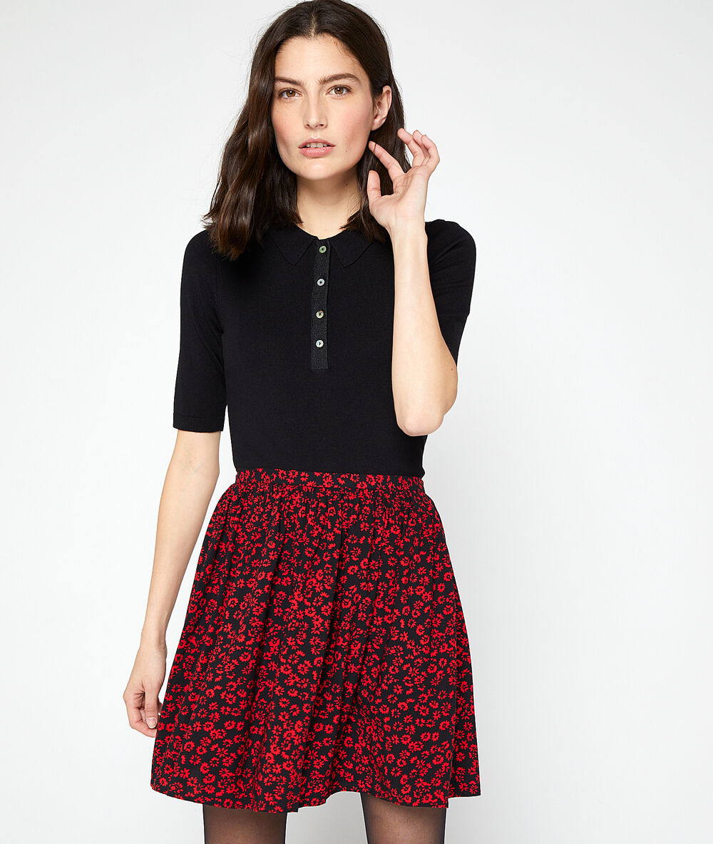 Polo en maille fine noir.