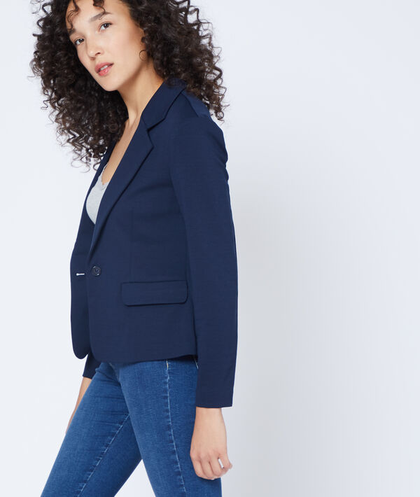 Veste de tailleur marine.