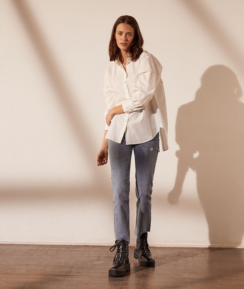 Chemise avec boutons dans le dos blanc.