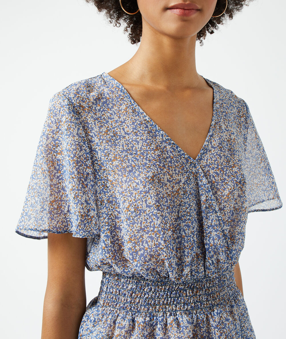 Blouse smockée imprimé fleuri ciel.