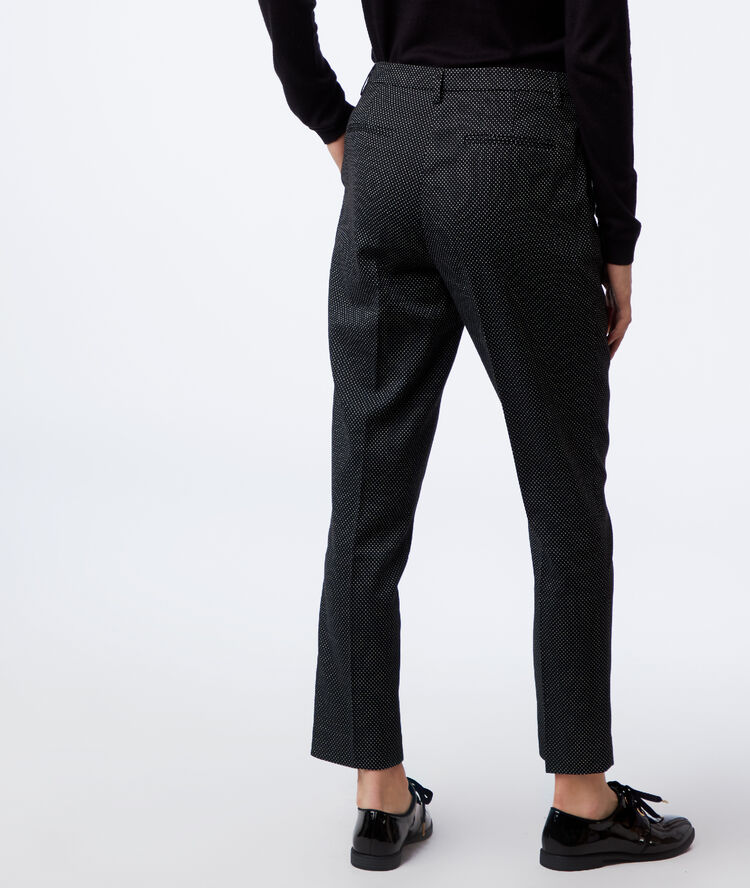 Pantalon cigarette à motifs jacquard noir.