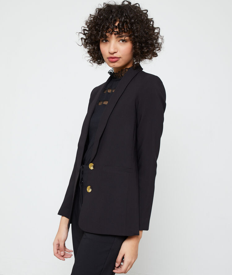 Veste de tailleur noir.