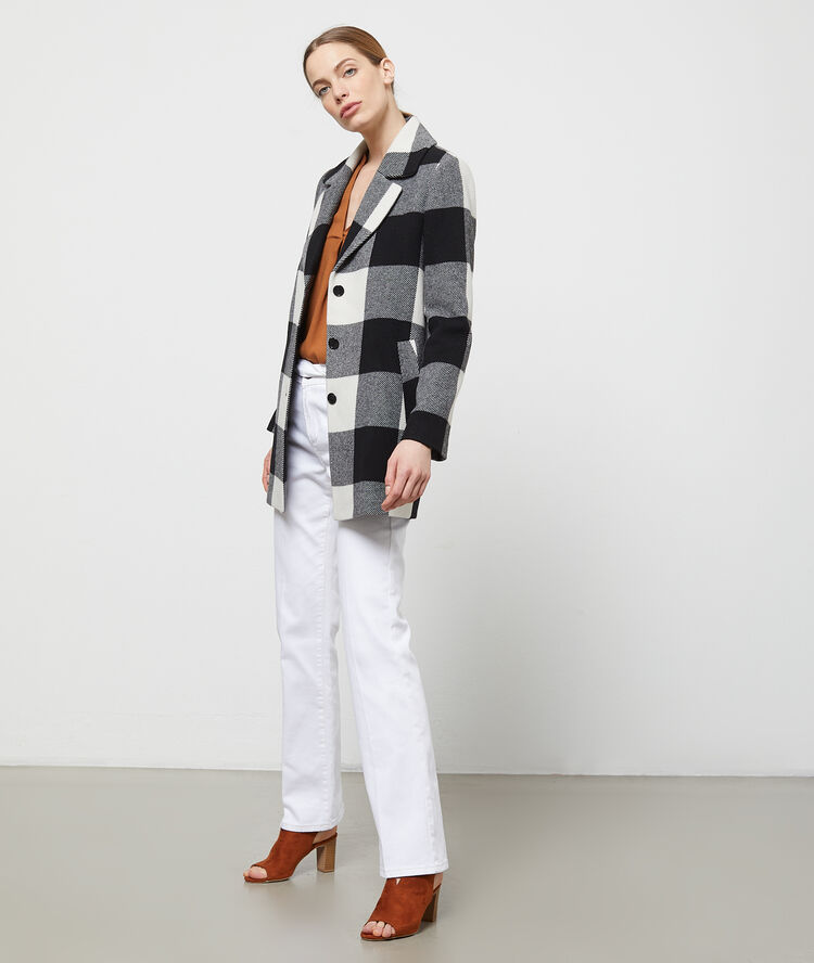 Pantalon flare ceinturé blanc.