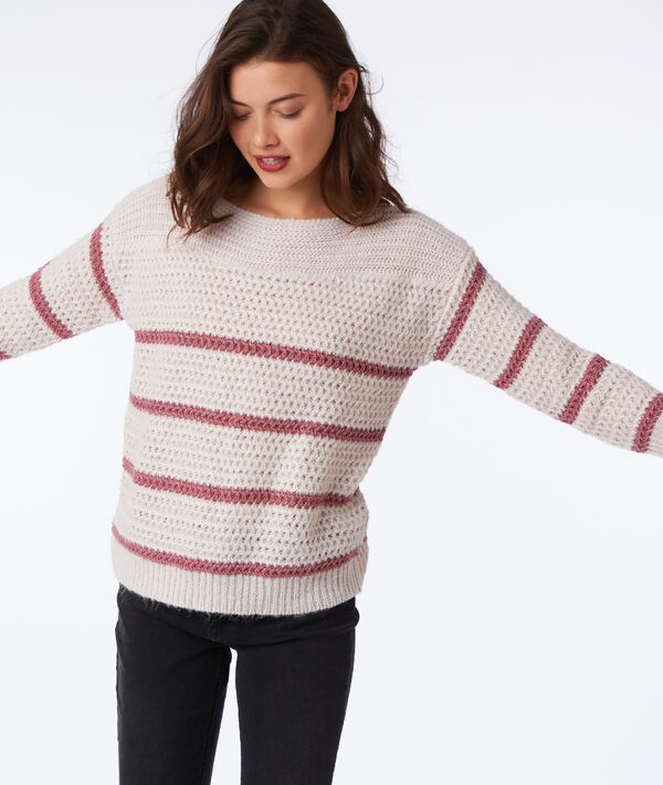 Pull grosse maille à fils métallisés nude.