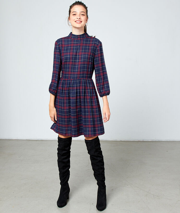 Robe dos noué à carreaux marine.