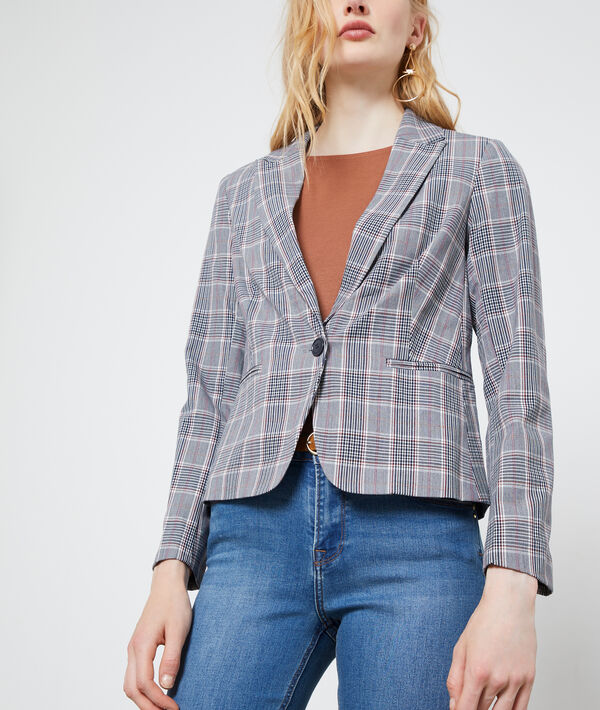 Veste de tailleur à carreaux noir.