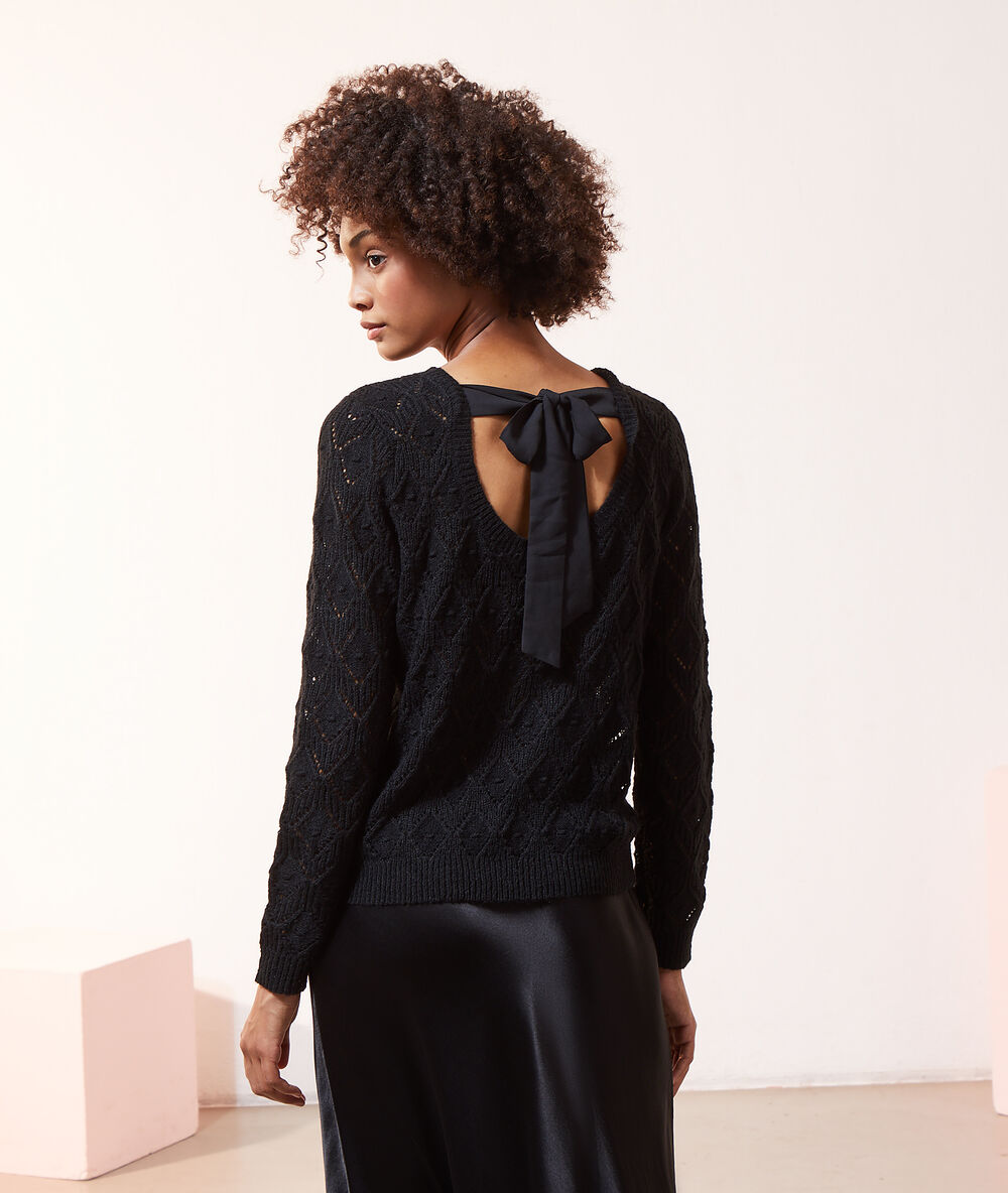 Pull maille pointelle noué au dos noir.