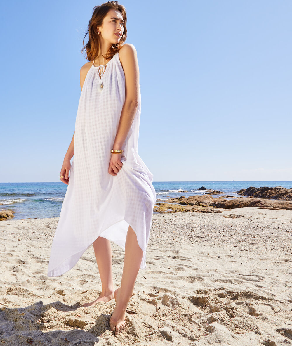 Robe de plage transparente avec pompoms ecru.