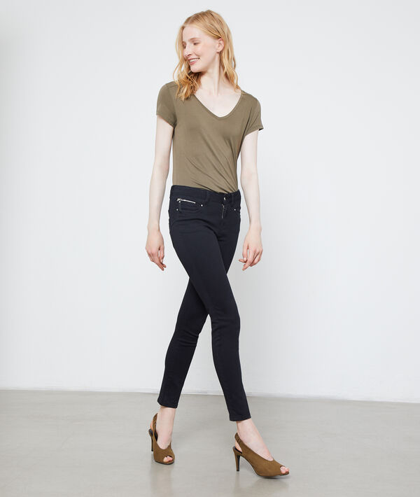 Pantalon slim noir.