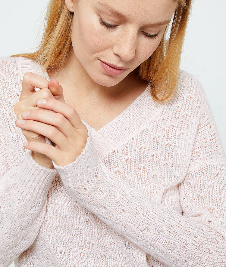 Pull en maille pointelle nude.