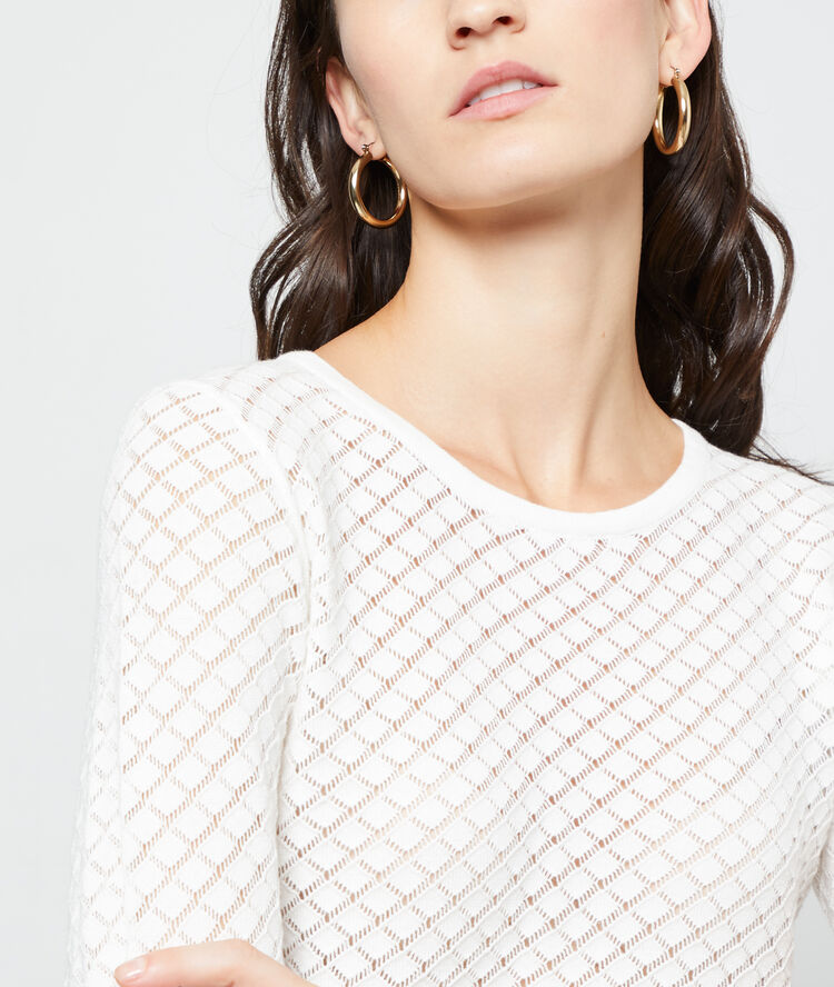 Pull en maille ajourée off-white.