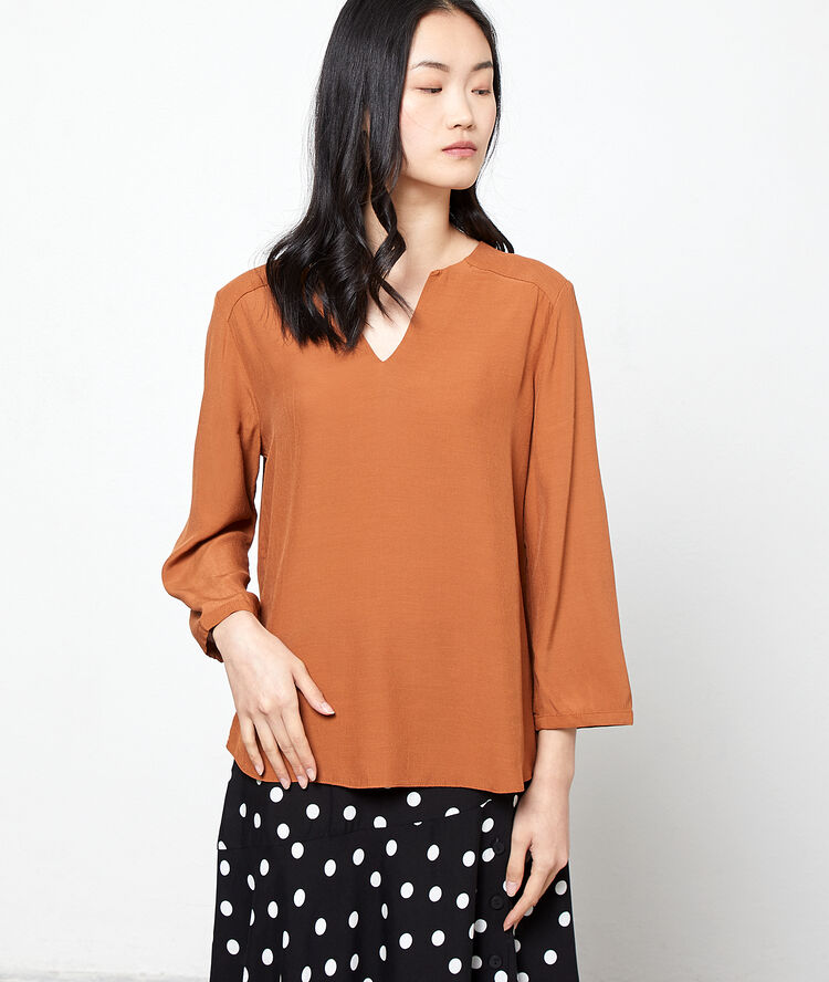 Blouse unie terre.