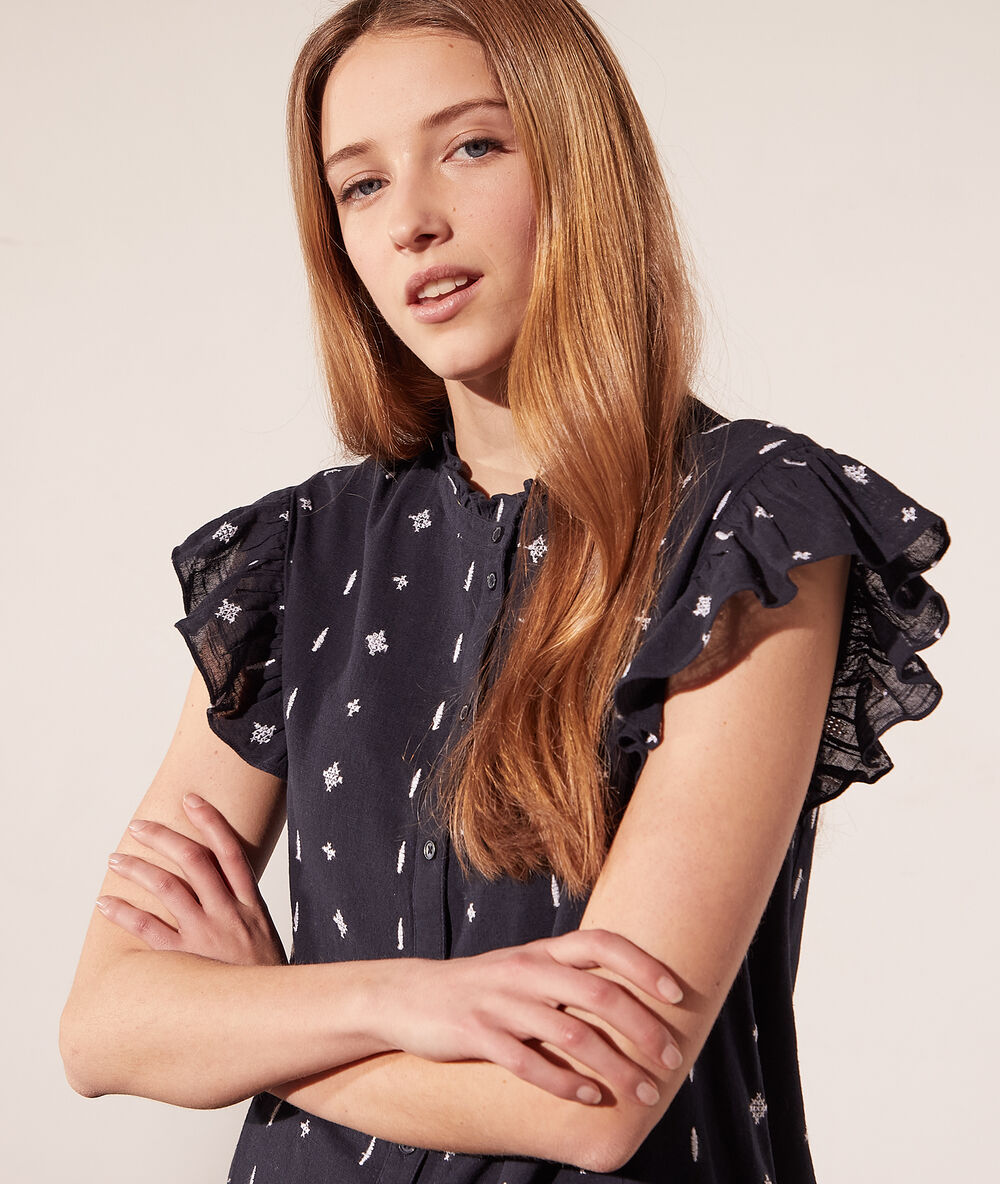 Robe chemise à motifs brodés bleu marine.
