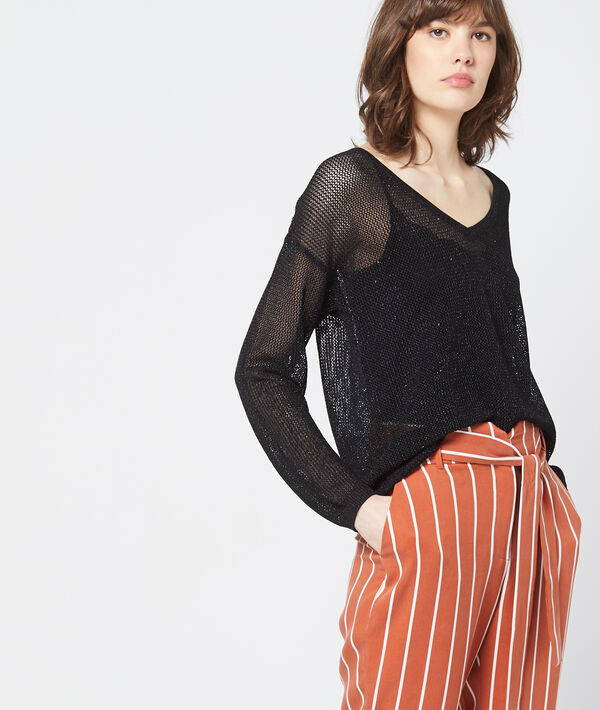 Pull transparent en maille métallisée noir.
