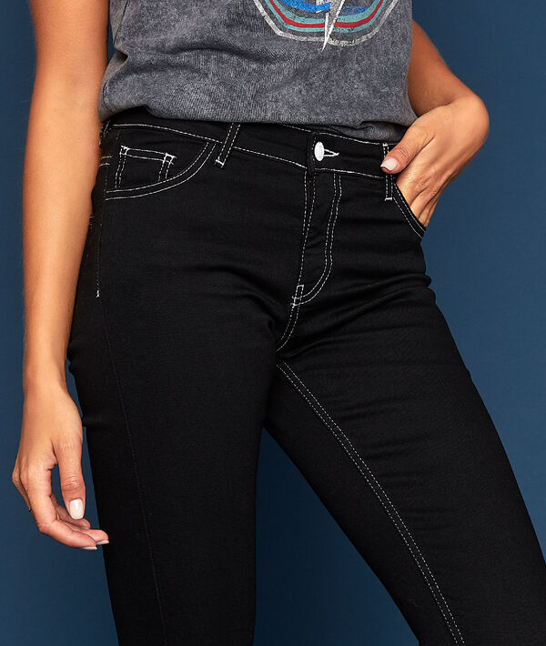 Jean skinny à coutures contrastées noir.