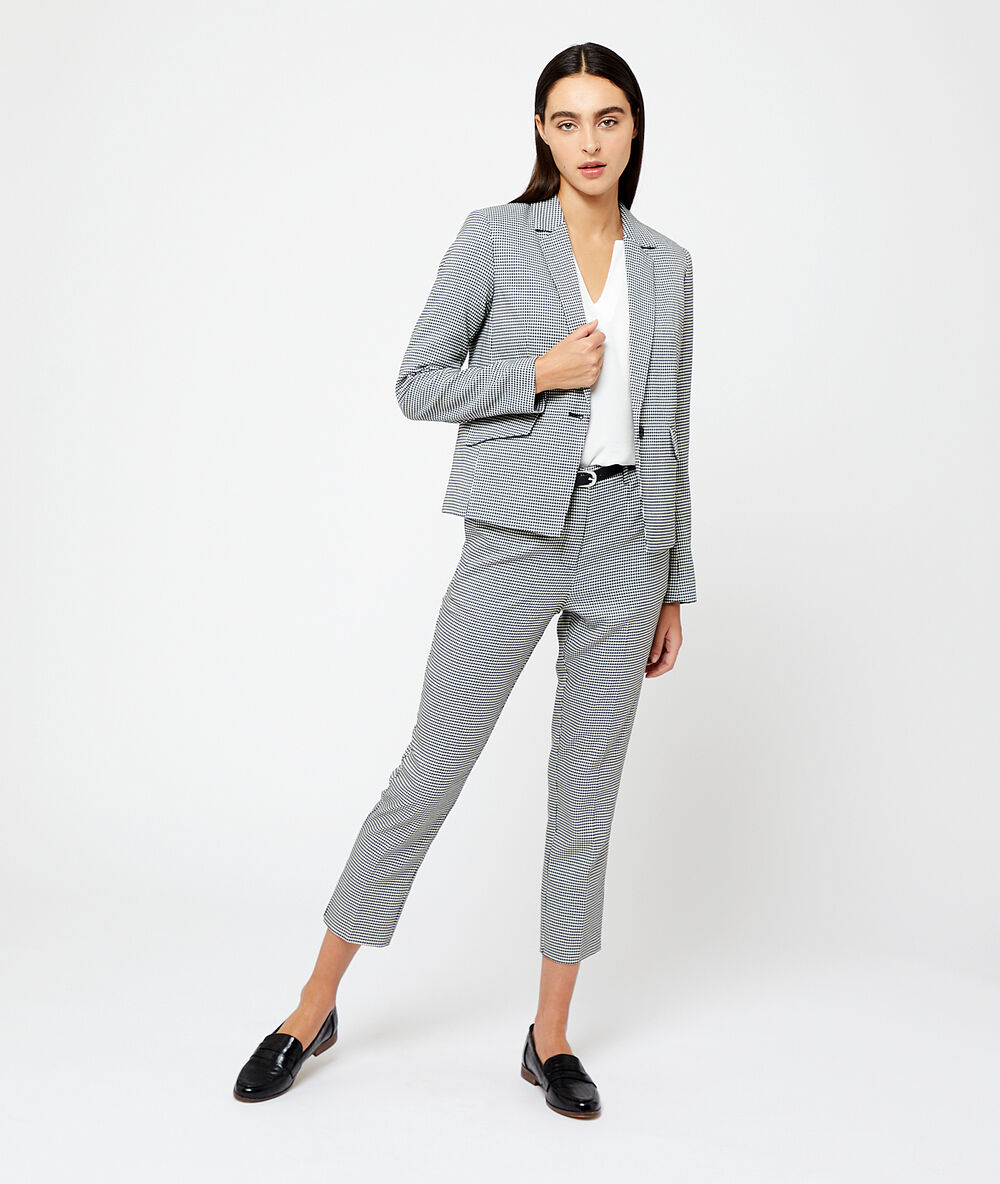 Pantalon ceinturé motifs pied de poule noir.