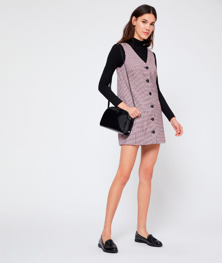 Sac besace effet vernis noir.